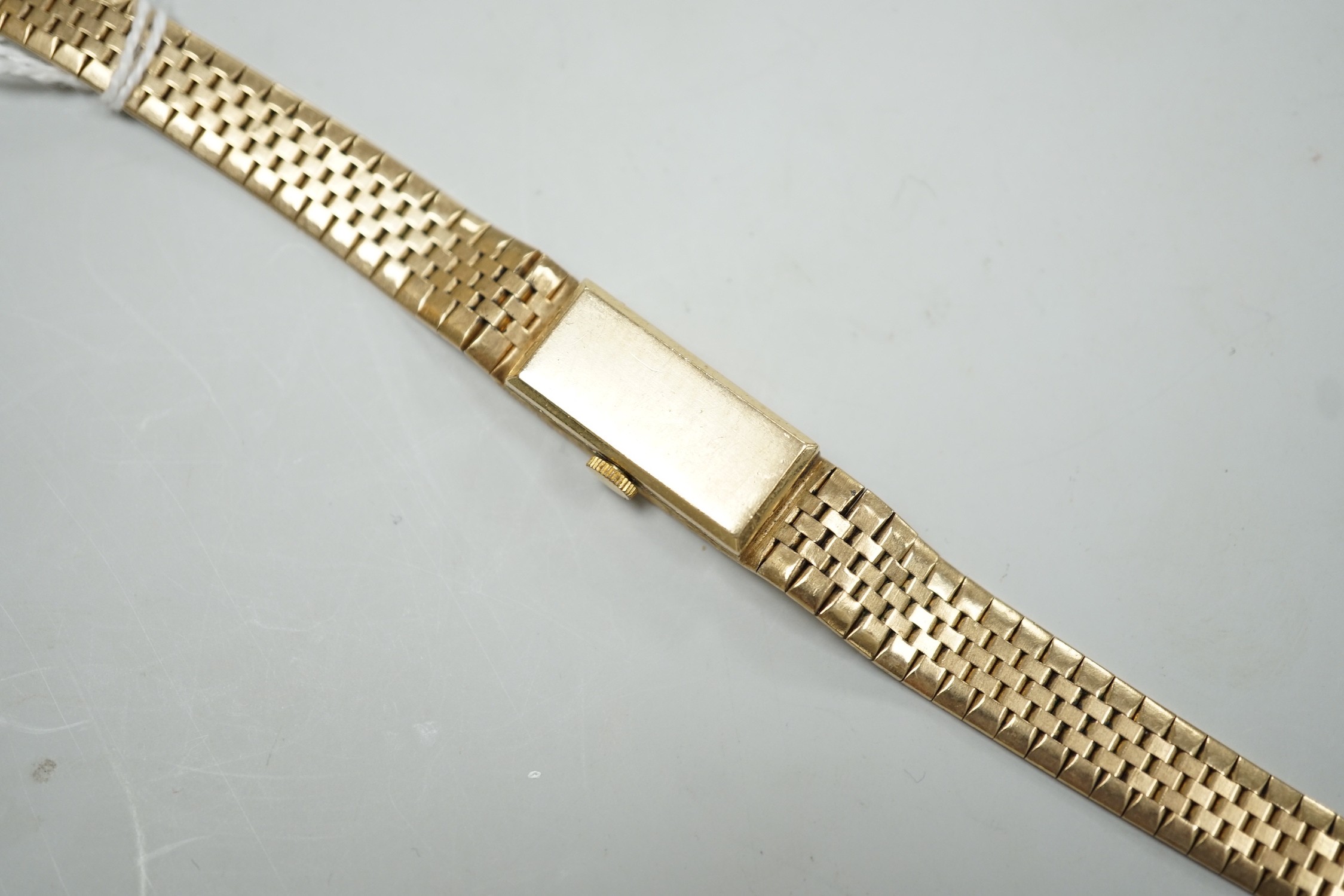 A lady's 9ct gold Buech Girod manual wind bracelet watch, 16.3cm, gross weight 25.3 grams